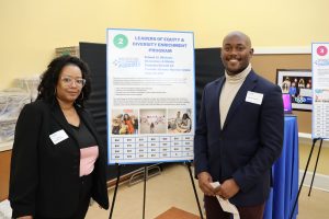 Following the Alumni recognition, a teacher grant “auction” was held. Six teachers presented grant proposals so that guests could make donations in support of their projects. (left to right) Mrs. Ayonna Green, Student & Family Engagement Coordinator and Mr. Damian Green.